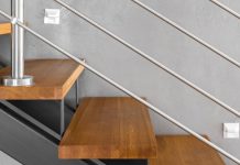 De essentiële elementen van trapontwerpen: van klassiek tot modern Moderne open trap met reling